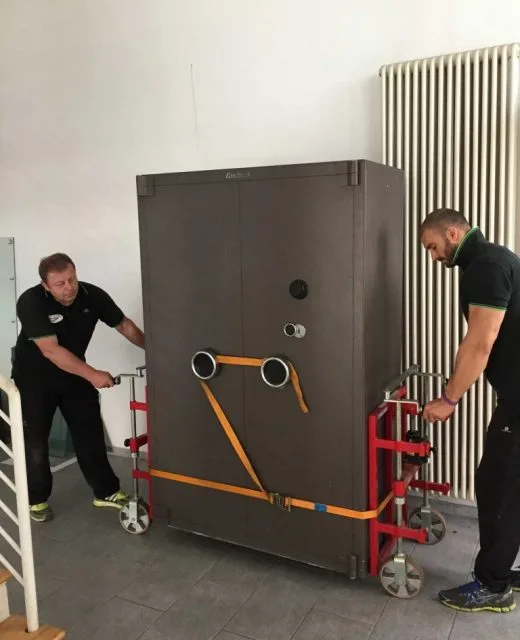 Safe secured to specialist moving equipment